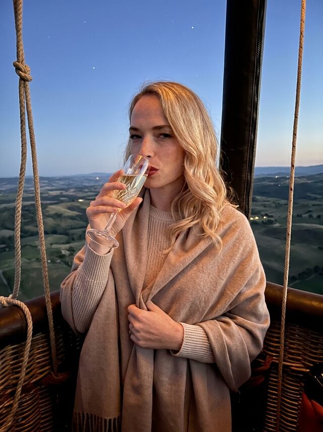 Champagne in a hot-air balloon at dawn